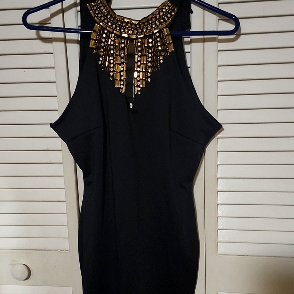 Black dress with goldneck closure